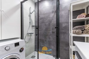 Shower, towels, toilet paper