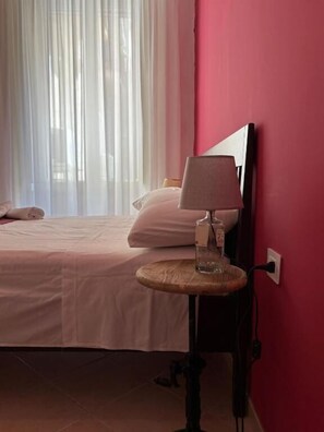 Desk, blackout drapes, soundproofing, iron/ironing board