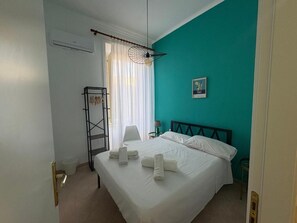 Desk, blackout drapes, soundproofing, iron/ironing board