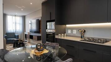 Deluxe Studio, Balcony, City View | Private kitchen | Full-size fridge, microwave, oven, stovetop