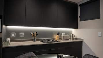 Deluxe Studio, Balcony, City View | Private kitchen | Full-size fridge, microwave, oven, stovetop