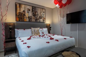 Luxury Apartment, 1 Bedroom, Balcony, City View | In-room safe, desk, laptop workspace, iron/ironing board - Lux Leisure Apartment Hotel Sandton (Sandton)