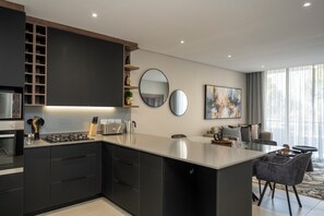 Luxury Apartment, 1 Bedroom, Balcony, City View | Private kitchen | Full-size fridge, microwave, oven, stovetop