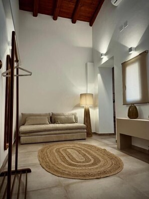 Suíte executiva | Cofres nos quartos, ferros/tábuas de passar roupa, Wi-Fi de cortesia