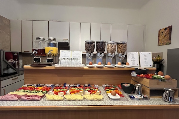 Daily cooked-to-order breakfast (EUR 15 per person)