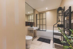 Regadera y secadora de cabello