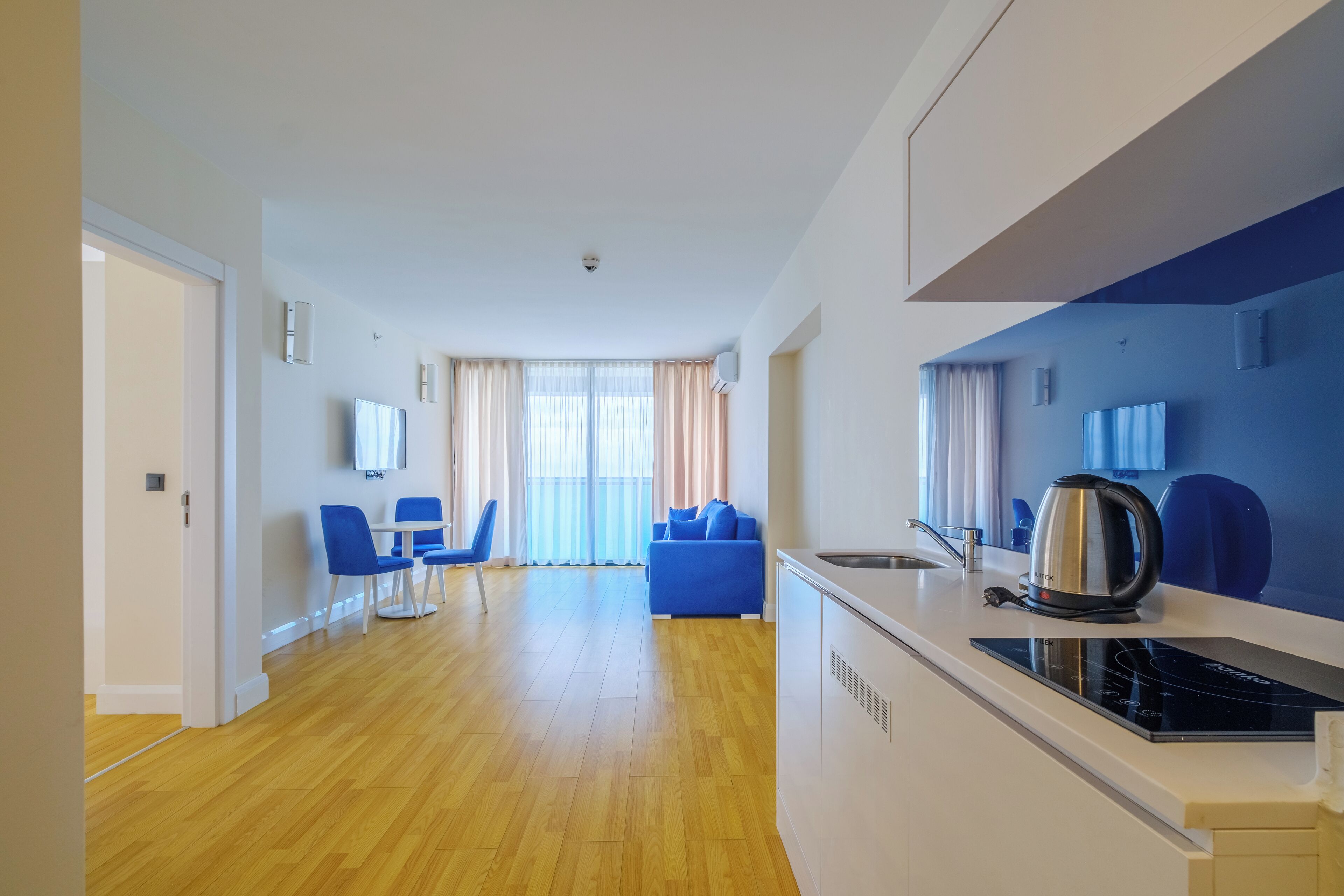 Family Apartment, Balcony, Sea View | Private kitchen | Cookware/dishes/utensils, dining tables