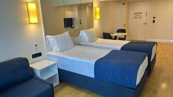 Twin Room, Balcony, Sea View | Minibar, laptop workspace, blackout drapes, free WiFi