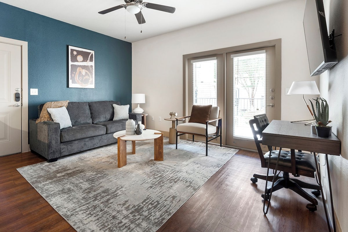 Standard Apartment (1 Bedroom) | Living area | 50-inch TV with digital channels