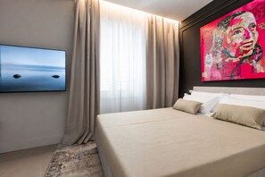 1 chambre, coffres-forts dans les chambres, fer et planche à repasser