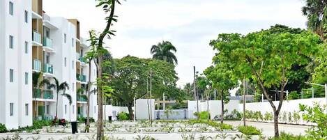 Apartment, 3 Bedrooms, Balcony, Pool View | Property grounds