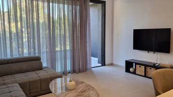 Departamento, 2 habitaciones | Área de sala de estar