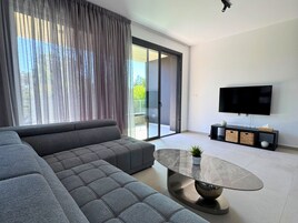 Apartment, 2 Bedrooms | Living area | TV