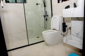 Shower, towels, soap, shampoo