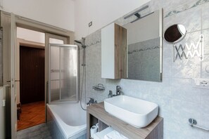 Hair dryer, bidet, towels, soap