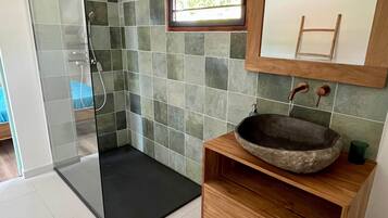 Shower, hair dryer, towels, soap
