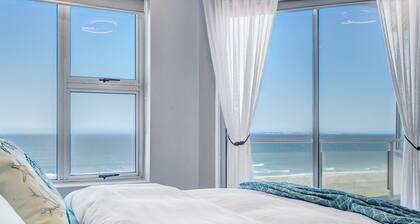 Dream beachfront escape with breathtaking Table Mountain, ocean and city views!