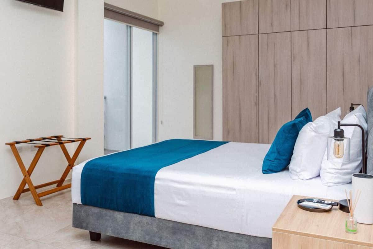 Suíte, sacada, vista para o mar | Cofres nos quartos, Wi-Fi de cortesia