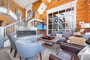 Smart TV, fireplace, books, stereo