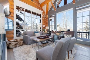 Smart TV, fireplace, books, stereo