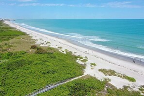 On the beach, sun-loungers, beach towels - Key West Style: 2B/2B Direct Beach Front Condo with Awesome Ocean views (Cocoa Beach)