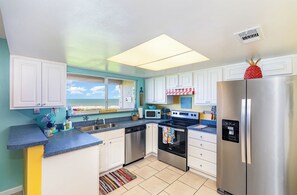 Fridge, microwave, oven, stovetop - Key West Style: 2B/2B Direct Beach Front Condo with Awesome Ocean views (Cocoa Beach)