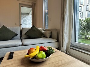 TV - HolidayHome Apartments | Airport Deluxe Condo with Terrace (Schönefeld)