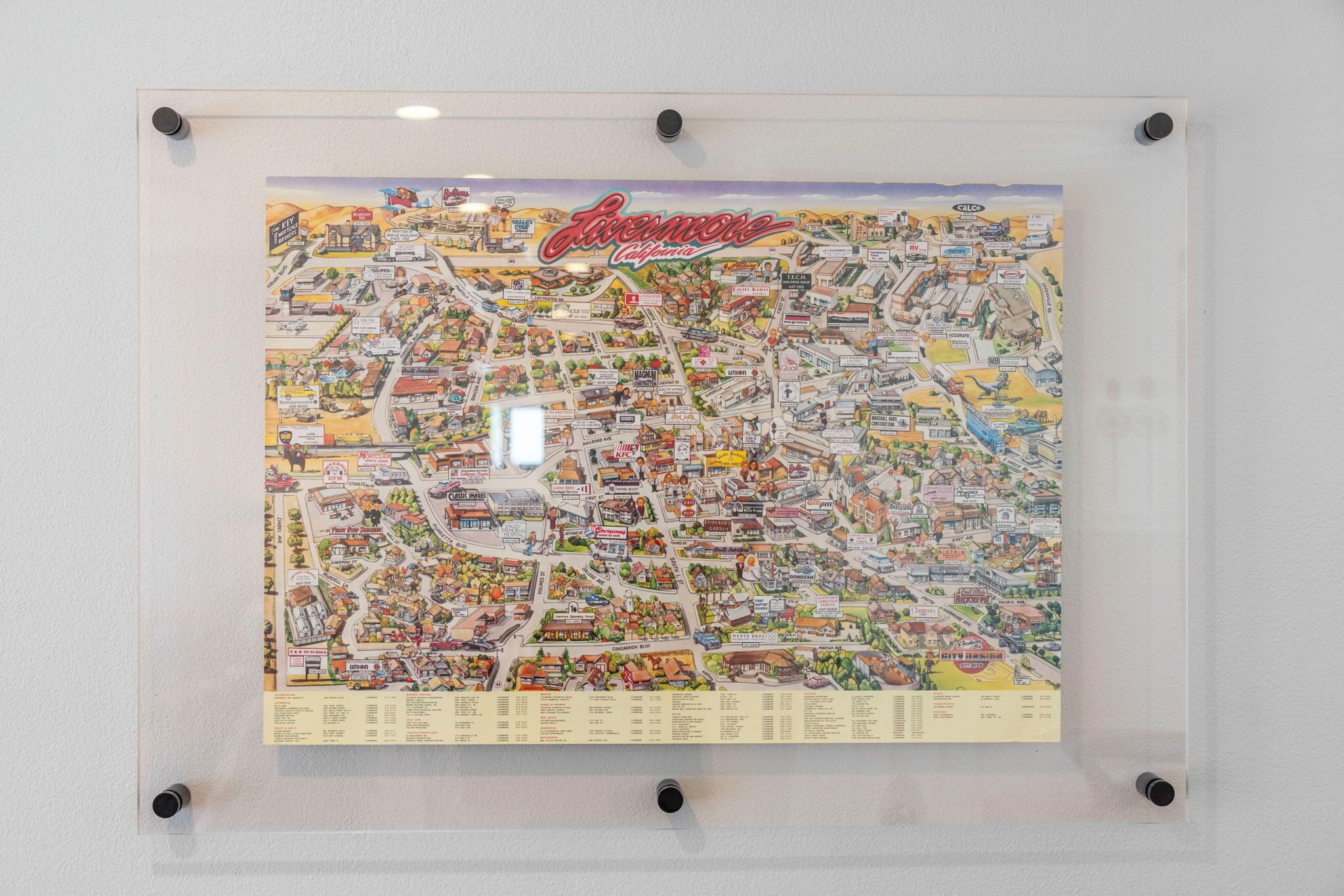 A framed city map of Los Angeles with street names and landmarks.