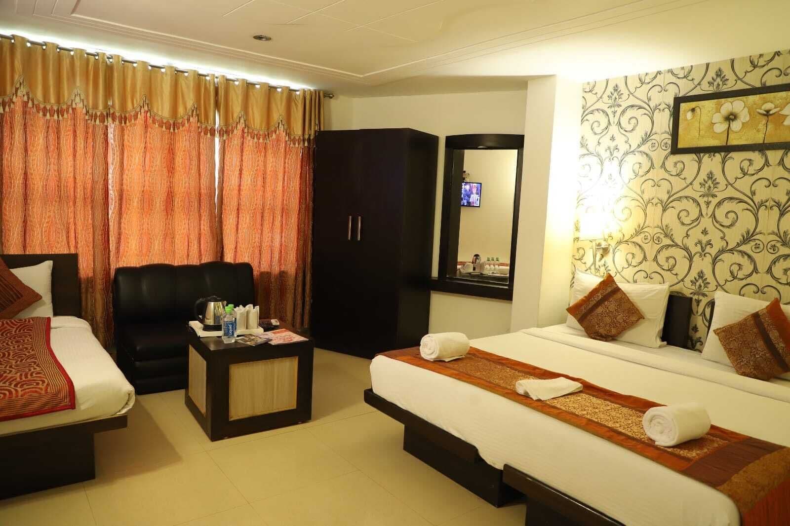 Deluxe-værelse til 3 personer - byudsigt | Gratis Wi-Fi