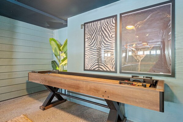 A pool table with a wooden frame and a foosball table attached to it. - Family Fun Resort Home! Heated Pool, Hot Tub, Pickleball & Arcades! 9 beds (Seminole)