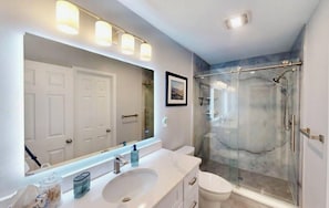 Shower, hair dryer, towels, soap