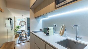 Comfort Apartment, River View | Private kitchen | Full-sized fridge, microwave, stovetop, dishwasher