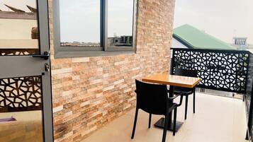 Superior Room, Balcony | Living area