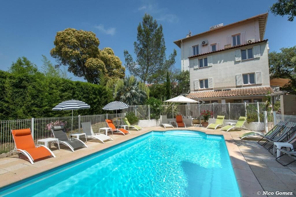 Seasonal outdoor pool, pool umbrellas, pool loungers