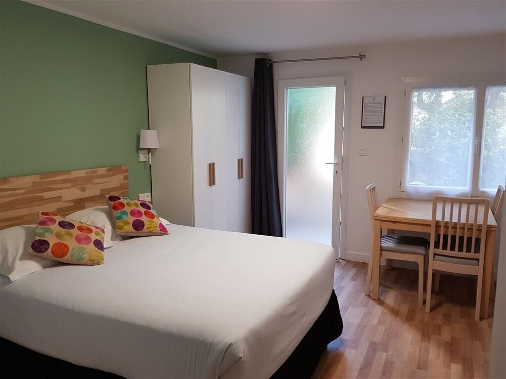 Studio, Patio, Garden View | Hypo-allergenic bedding, memory-foam beds, minibar, in-room safe