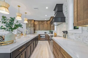 Private kitchen - New 8 bedroom house with tropical oasis backyard! Heated pool and spa. (Sarasota)