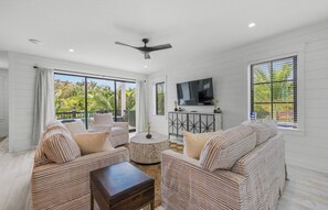 Living area - New 8 bedroom house with tropical oasis backyard! Heated pool and spa. (Sarasota)