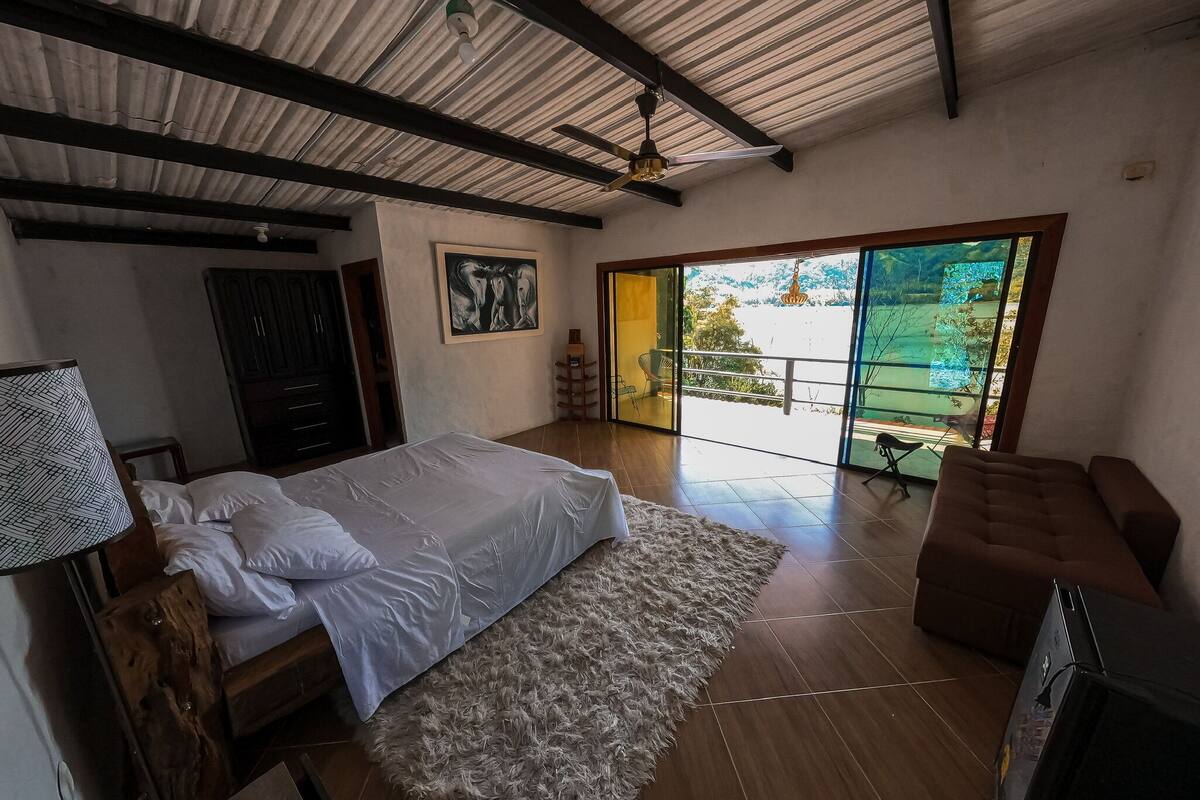 Habitación doble Confort, balcón, vista a la laguna | Cortinas blackout