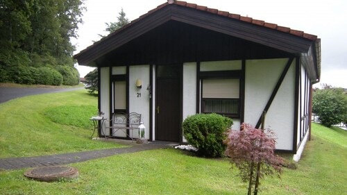 Bungalow 21 on the edge of the forest with terrace and view of the Wasserkuppe.