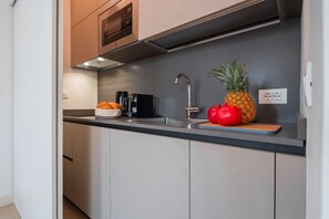Fridge, microwave, toaster, high chair
