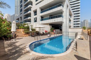 2 outdoor pools, pool umbrellas, pool loungers