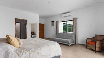 Premium bedding, desk, laptop workspace, blackout drapes