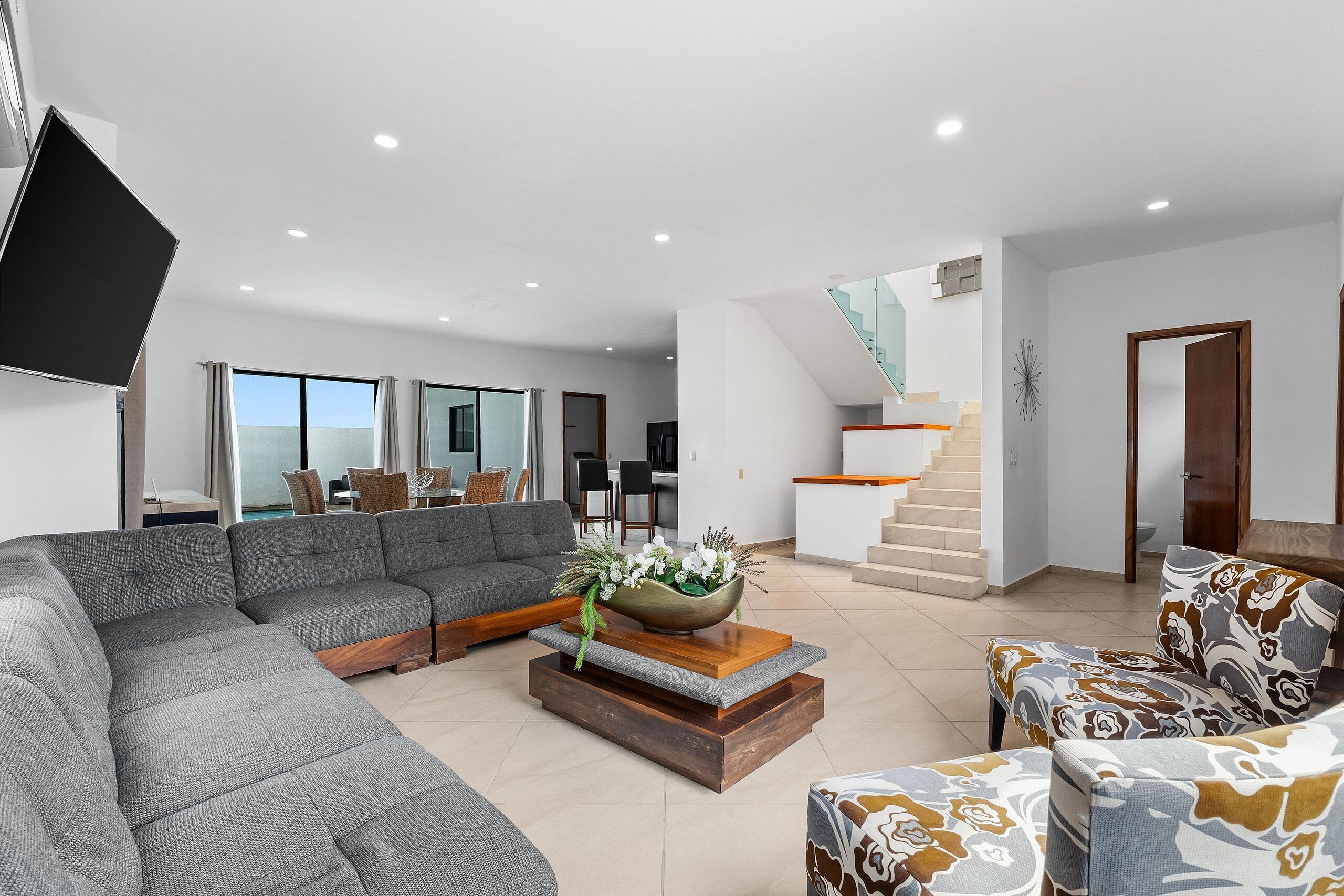 Villa | Living area | 65-inch LED TV with cable channels