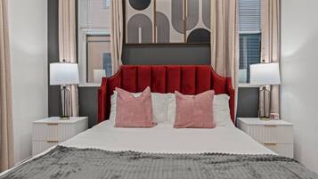 1 bedroom, desk, iron/ironing board, travel crib