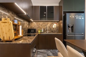 Economy Apartment, 2 Bedrooms, Balcony, City View | Hypo-allergenic bedding, minibar, individually decorated