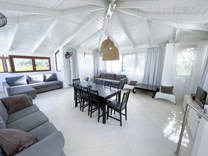 Comfort Villa, 2 Bedrooms, Balcony, Garden View | Living area | 32-inch flat-screen TV with cable channels - KORALES BEACH APARTMENTS (Punta Cana)