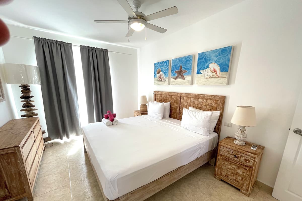 Deluxe Apartment, 2 Bedrooms, Pool View | In-room safe, free WiFi