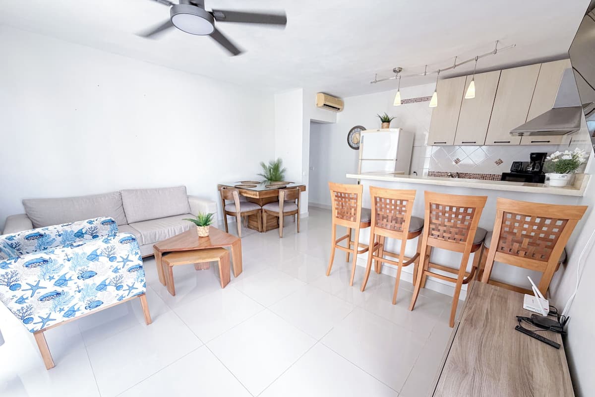 Deluxe Villa, 2 Bedrooms, Pool View | Living area | 32-inch flat-screen TV with cable channels