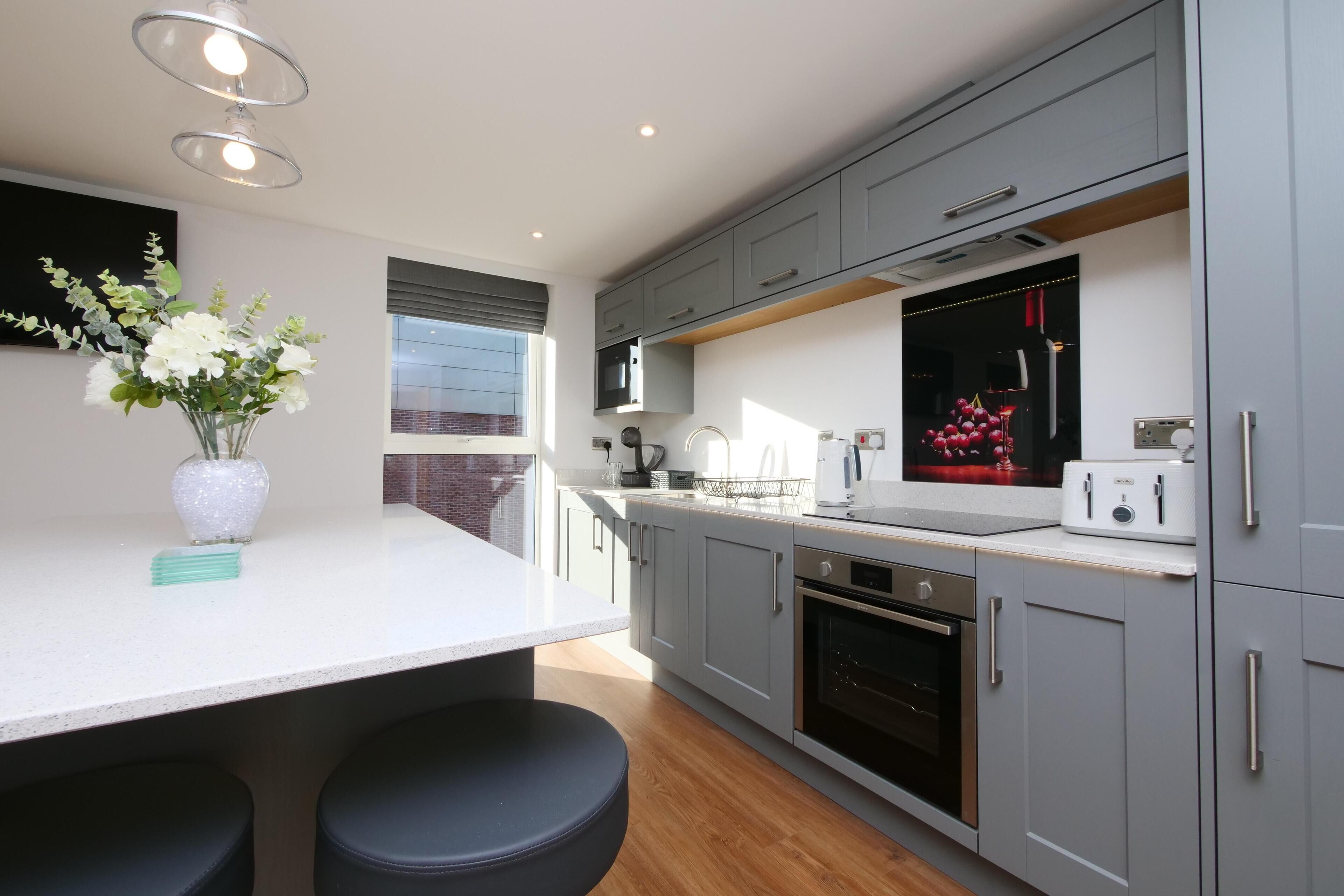 Fridge, microwave, coffee/tea maker, dining tables