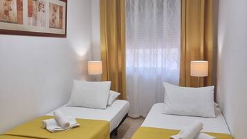 Familie appartement | Verduisterende gordijnen, een strijkplank/strijkijzer, gratis wifi